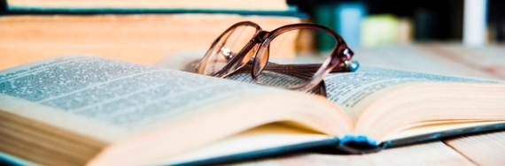 Book and reading glasses