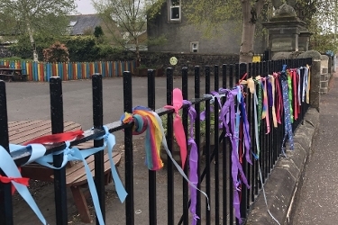 Colourful ribbons on the fence at Balbardie Primary