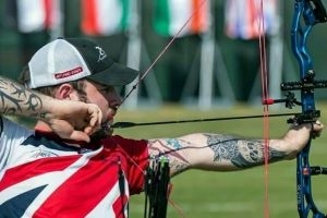 Nathan MacQueen preparing to fire his bow