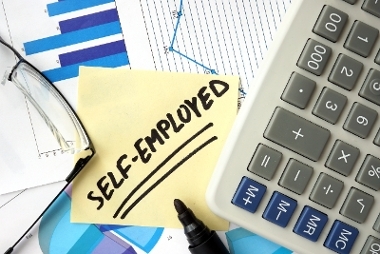 Self Employed Written on Post-it Note